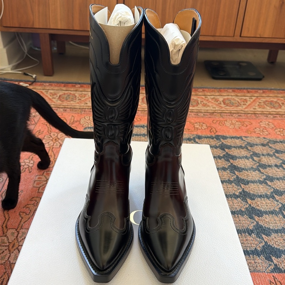 Christian Dior black colour-block western boots.